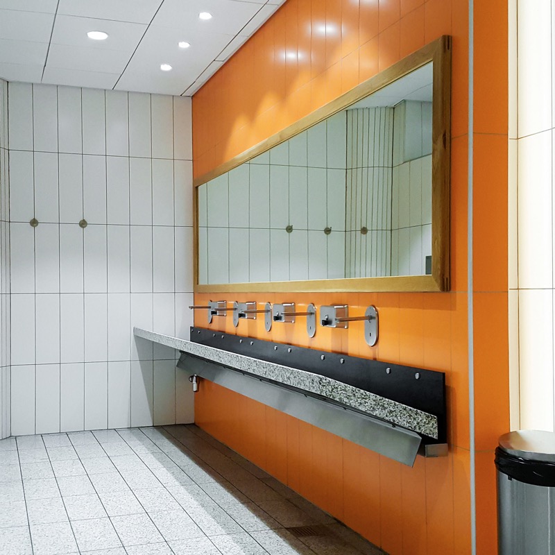 public empty-restroom-with-washstands-mirror-PRT5QAT